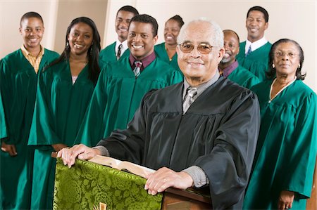 Minister at podium with Gospel Choir, portrait Stock Photo - Premium Royalty-Free, Code: 693-03686356