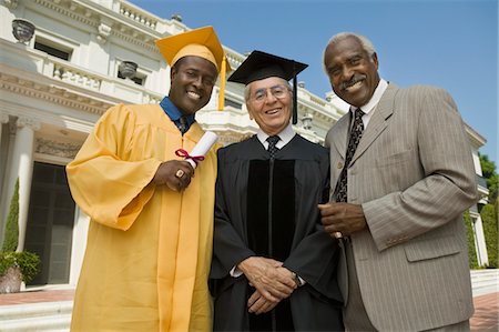 simsearch:693-06014177,k - Graduate with dean and father outside university, low angle view, portrait Stock Photo - Premium Royalty-Free, Code: 693-03686367