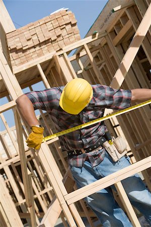 simsearch:693-06016727,k - Construction worker measuring building Stock Photo - Premium Royalty-Free, Code: 693-03707174
