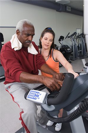 senior fitness black woman - Personal Trainer Working with Senior Man Stock Photo - Premium Royalty-Free, Code: 693-03707261