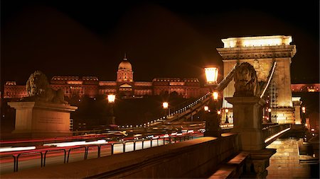 simsearch:400-05716374,k - Night cityscape of the Chain bridge across the river Danube with the Buda castle in the background in the Hungarian capital,Budapest Stock Photo - Premium Royalty-Free, Code: 693-03782637