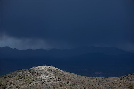 Storm Clouds and Summit Cross, Pioche, Nevada, USA Stock Photo - Rights-Managed, Code: 700-04003377