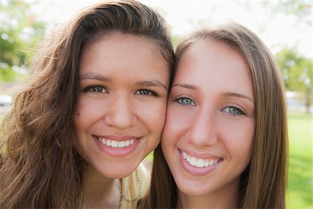 Close-Up Portrait of Two Teenage Girls Stock Photo - Rights-Managed, Code: 700-04163455