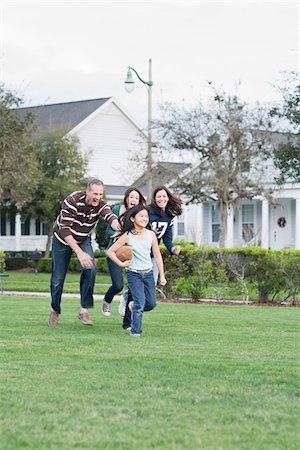 family activities - Family Playing Football Stock Photo - Rights-Managed, Code: 700-04625376