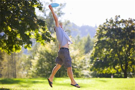 Homme jouer au Frisbee Photographie de stock - Rights-Managed, Code: 700-04931687