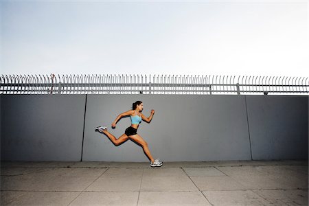 Woman Running Foto de stock - Con derechos protegidos, Código: 700-05451078