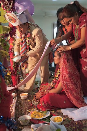 Hindu Wedding Ceremony for Nepalese Couple, Bangkok, Thailand Stock Photo - Rights-Managed, Code: 700-05452192