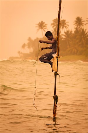 Stilt Fisherman, Ahangama, Sri Lanka Foto de stock - Con derechos protegidos, Código: 700-05642144