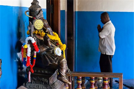 praying - Elephant Statue and Man Praying in Gangaramaya Temple, Colombo, Sri Lanka Stock Photo - Rights-Managed, Code: 700-05642560
