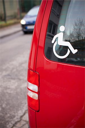 sticker - Disabled Sign on Back of Vehicle Stock Photo - Rights-Managed, Code: 700-05756225