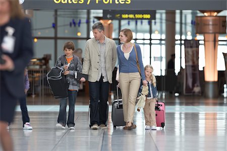 preteen girl - Family in Airport Stock Photo - Rights-Managed, Code: 700-05756437