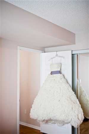simsearch:700-05786438,k - Bridal Gown Hanging on Door Stock Photo - Rights-Managed, Code: 700-05786437