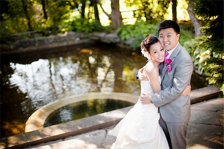 smiling bride - Bride and Groom near Pond Stock Photo - Rights-Managed, Code: 700-05786444