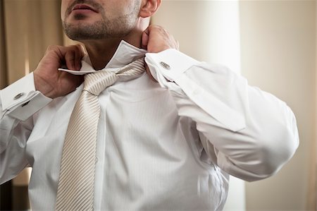 shirt tie - Groom Getting Dressed Stock Photo - Rights-Managed, Code: 700-05786480