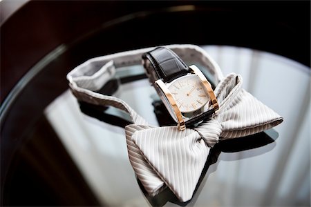 Noeud papillon et montre-bracelet Photographie de stock - Rights-Managed, Code: 700-05803131