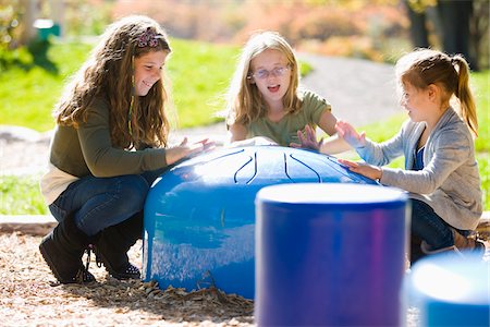 people in playground - Sisters Drumming at Playground Stock Photo - Rights-Managed, Code: 700-05821913