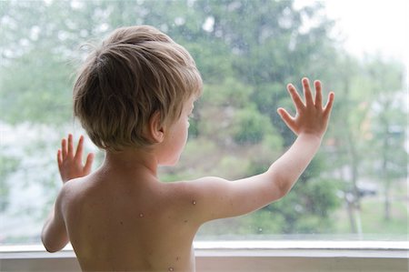 rear view of a boy - Boy with Chicken Pox Looking Out Window Stock Photo - Rights-Managed, Code: 700-05969972