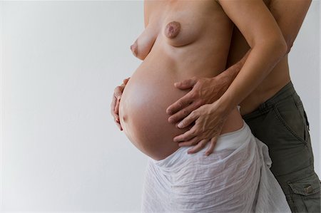 expecting - Pregnant Couple in Studio Stock Photo - Rights-Managed, Code: 700-05973490