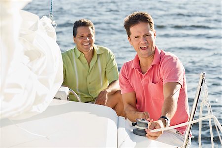 sail (fabric for transmitting wind) - Two Men on Boat Stock Photo - Rights-Managed, Code: 700-06009222