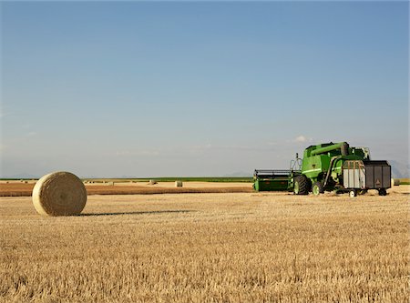 prairie - Wheat Combine and Hay Bales, Pincher Creek, Alberta, Canada Stock Photo - Rights-Managed, Code: 700-06038200