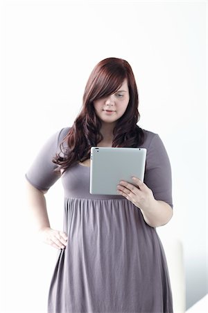 Woman with iPad Stock Photo - Rights-Managed, Code: 700-06144778