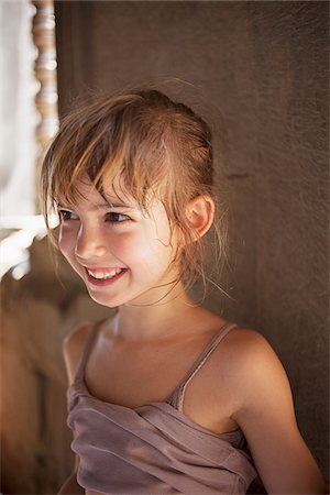 Close-Up of Smiling Girl Foto de stock - Con derechos protegidos, Código: 700-06199246