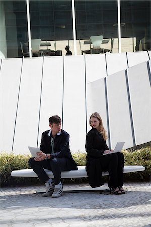 Business People with Laptops Sitting on Bench Stock Photo - Rights-Managed, Code: 700-06368089