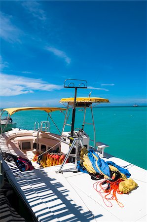 sail (fabric for transmitting wind) - Parasailing Boat Docked at Pelican Pier, Palm Beach, Aruba, Leeward Antilles, Lesser Antilles, Caribbean Stock Photo - Rights-Managed, Code: 700-06439046