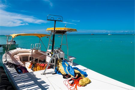 sail (fabric for transmitting wind) - Parasailing Boat Docked at Pelican Pier, Palm Beach, Aruba, Leeward Antilles, Lesser Antilles, Caribbean Stock Photo - Rights-Managed, Code: 700-06439047