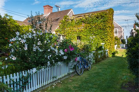 Bicycle Leaning on Fence, Provincetown, Cape Cod, Massachusetts, USA Stock Photo - Rights-Managed, Code: 700-06439122