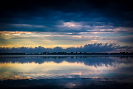 Storm Clouds over Lake at Dusk, King Bay, Point Au Fer, Champlain, New York State, USA Stock Photo - Rights-Managed, Code: 700-06465589