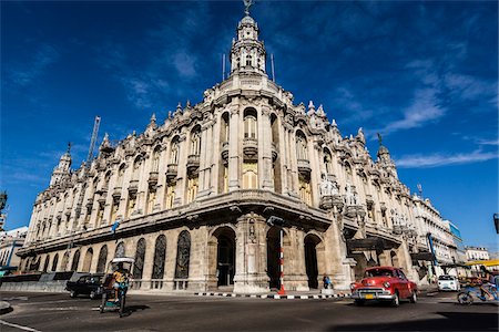 Traffic Passing by Great Theatre of Havana (Gran Teatro de La Habana) with Bright Blue Sky, Havana, Cuba Photographie de stock - Rights-Managed, Code: 700-06486565