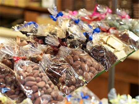 simsearch:700-06531927,k - Close-up of Assorted Chocolates in Cellophane Bags on Shelf in Shop, Le Chocolate par Michel Chaudun, Paris, France Stock Photo - Rights-Managed, Code: 700-06531930