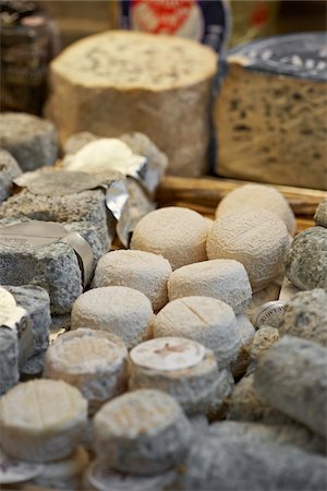 simsearch:700-06531927,k - Fresh wedges and rounds of French goat cheese in artisan cheese shop, La Fromagerie, Paris, France Stock Photo - Rights-Managed, Code: 700-06531957