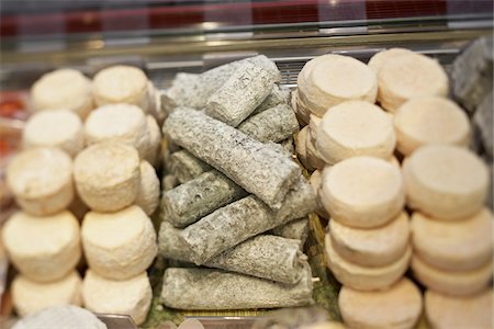 simsearch:700-06531927,k - Fresh wedges and rounds of French goat cheese in artisan cheese shop, La Fromagerie, Paris, France Stock Photo - Rights-Managed, Code: 700-06531953