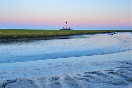 simsearch:700-06368432,k - Westerhever Lighthouse at Low Tide at Dawn, Summer, Westerhever, Tating, Schleswig-Holstein, Germany Stock Photo - Rights-Managed, Code: 700-06576222