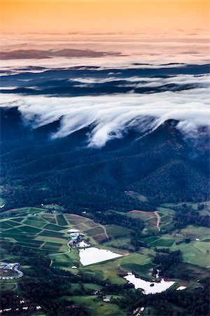 Aerial view of wine country near Pokolbin as mist comes in over the Brokenback Range, Hunter Valley, New South Wales, Australia Stock Photo - Rights-Managed, Code: 700-06675131