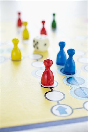 dice - close-up of ludo board game with colored playing pieces and dice Stock Photo - Rights-Managed, Code: 700-06679354