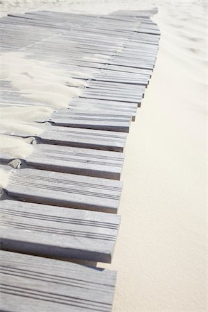 Sand Covered Boardwalk Footpath Leading to Beach Fotografie stock - Rights-Managed, Codice: 700-06714058