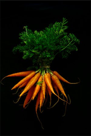 root vegetable - Local Organic Carrots on black. Gordon, Georgia. Stock Photo - Rights-Managed, Code: 700-06819386