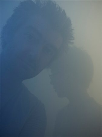 Man and Boy in fog during exhibition in Grand Palais, Paris Stock Photo - Rights-Managed, Code: 700-06892581