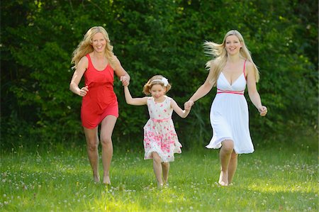 summer family running - Woman with her daughter and her mother in summer, Bavaria, Germany. Stock Photo - Rights-Managed, Code: 700-06939627