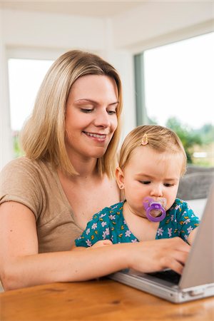 simsearch:700-06962061,k - Young Woman and Baby Girl using Computer, Mannheim, Baden-Wurttemberg, Germany Stock Photo - Rights-Managed, Code: 700-06962194