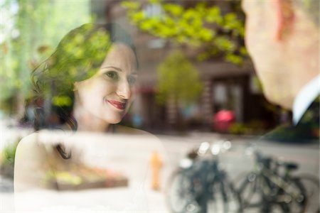 special moment - Close-up portrait of bride and groom sitting indoors next to window, with reflections in glass, Ontario, Canada Stock Photo - Rights-Managed, Code: 700-07199877