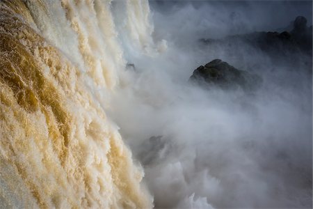 ferocious - Close-up of waterfall cascading over edge, scenic view of Iguacu Falls, Iguacu National Park, Parana, Brazil Stock Photo - Rights-Managed, Code: 700-07204173