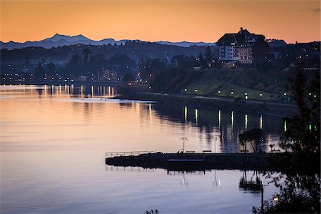 simsearch:700-07237687,k - Scenic view of shoreline and city at sunset, Puerto Varas, Llanquihue Province, Patagonia, Chile Stock Photo - Rights-Managed, Code: 700-07203978