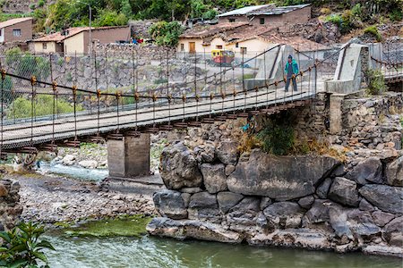 Person crossing suspension cable bridge over river, Sacred Valley of the Incas in the Andes mountains, Peru Photographie de stock - Rights-Managed, Code: 700-07238031