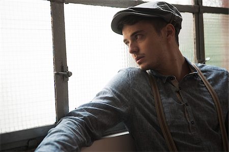 Portrait of Young Man by Window, Mannheim, Baden-Wurttemberg, Germany Stock Photo - Rights-Managed, Code: 700-07238135