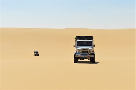 sands and desert and nobody and landscape - Four Wheel Drive Cars in Desert, Matruh Governorate, Libyan Desert, Sahara Desert, Egypt, Africa Stock Photo - Rights-Managed, Code: 700-07279256