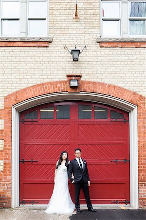 Portrait of Bride and Groom in front of Fire Station Stock Photo - Rights-Managed, Code: 700-07363837